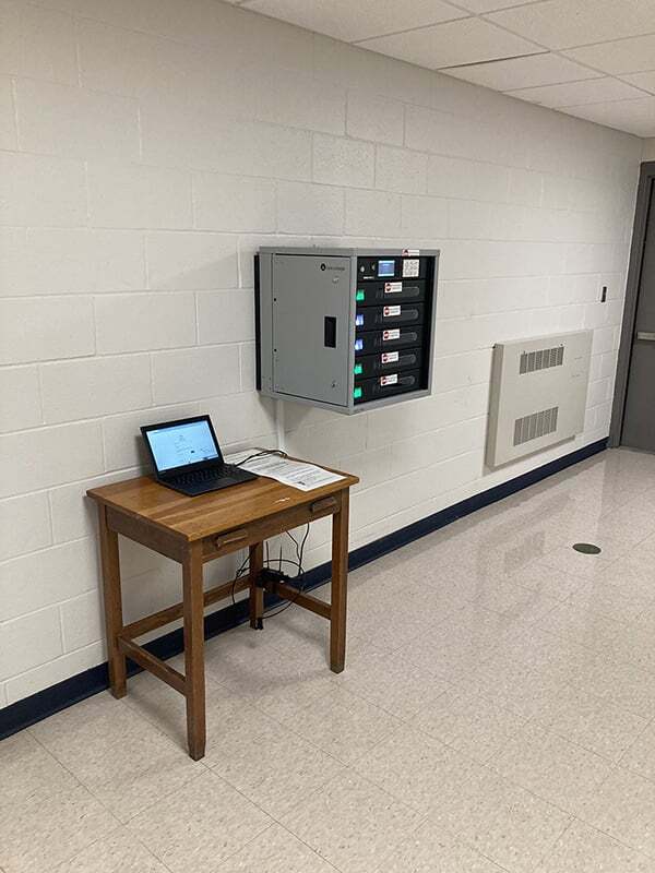 LocknCharge FUYL Tower 5 Smart Charging Locker wall mounted in a hallway at Mondovi Schools